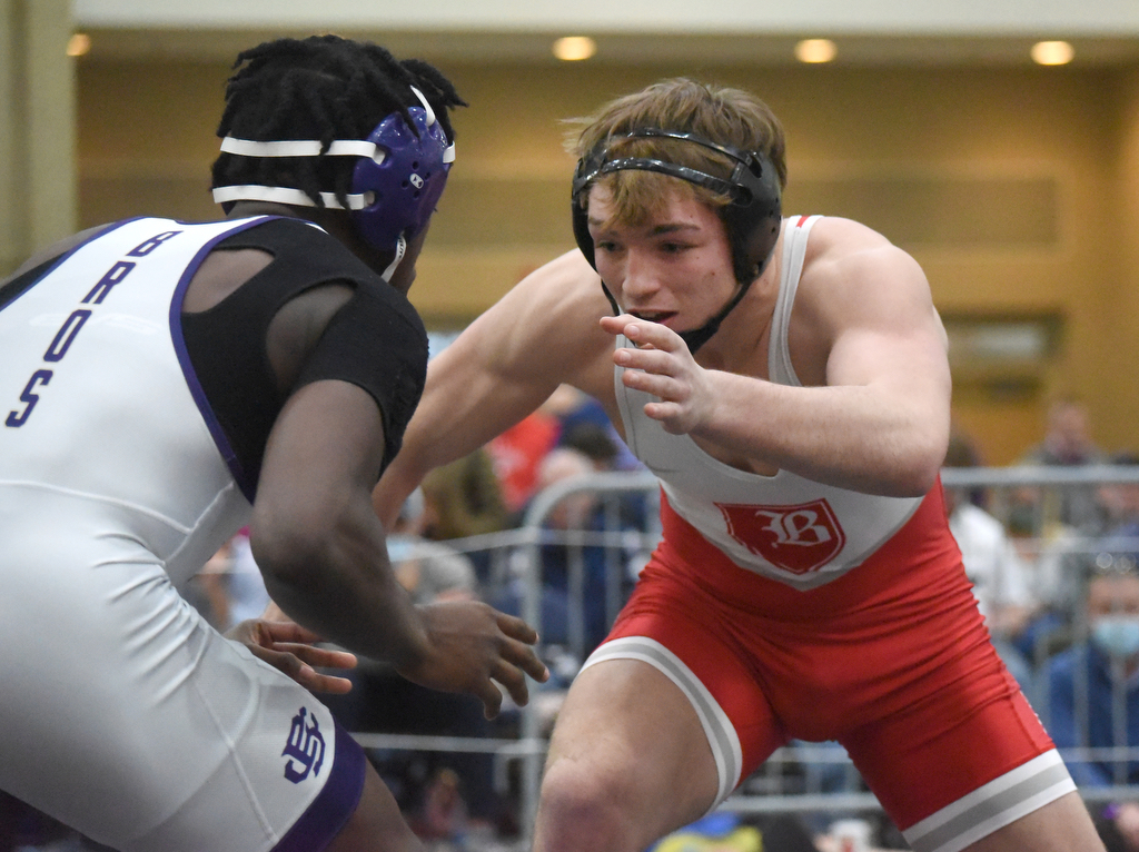 Staff photo by Matt Hamilton / Baylor's David Harper, right, wrestles Christian Brothers' Theo Sewell in the 195-pound final at the TSSAA Division II state traditional tournament at the Chattanooga Convention Center on Feb. 25, 2021.