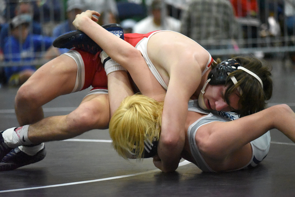 Staff photo by Matt Hamilton / Baylor's Nick Corday, top, wrestles Lakeway Christian's Jay Eversole in the 113-pound final at the TSSAA Division II state traditional tournament at the Chattanooga Convention Center on Feb. 25, 2021.