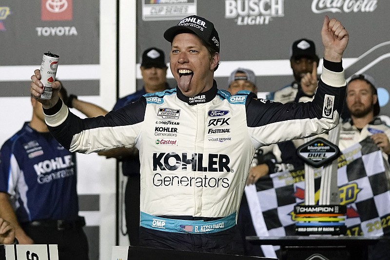 AP photo by John Raoux / Brad Keselowski celebrates after winning the first of two NASCAR Daytona 500 qualifying races Thursday night at Daytona International Speedway.