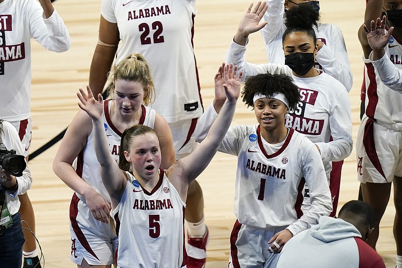 AP photo by Eric Gay / Alabama guards Hannah Barber (5) and guard Megan Abrams (1) celebrate after an NCAA tournament victory against North Carolina last March. Abrams and Barber helped the Crimson Tide to a big SEC win at home Thursday night against Tennessee.