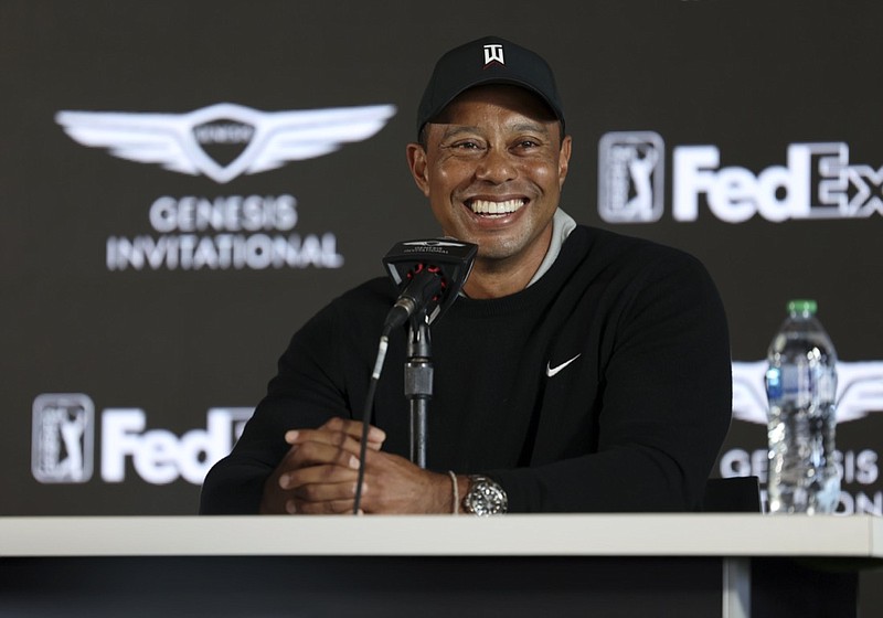 Tiger Woods speaks during a news conference for the Genesis Invitational golf tournament at Riviera Country Club, Wednesday, Feb. 16, 2022, in the Pacific Palisades area of Los Angeles. (AP Photo/Ryan Kang)