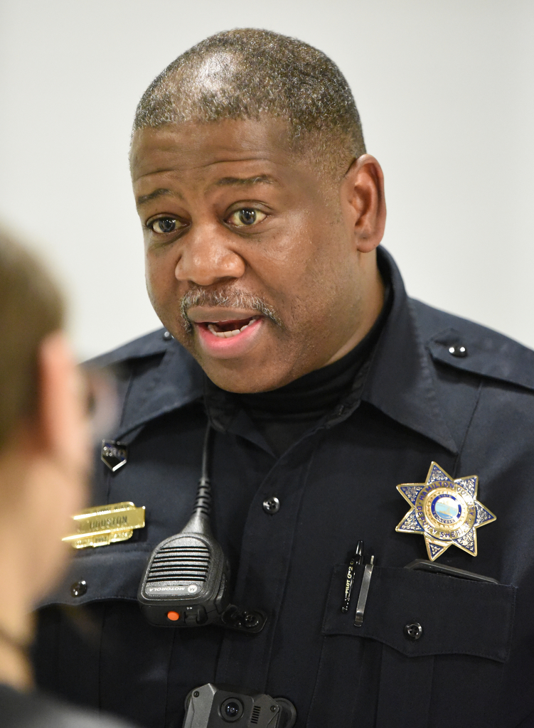 Staff Photo by Matt Hamilton / School resource officer Mike Houston talks to students as he teaches archery at Lofts Middle School in Hixson on Thursday, February 17, 2022.