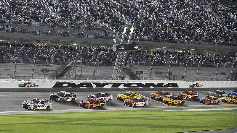 AP photo by Phelan M. Ebenhack / Alex Bowman (48) leads the field during the start of the second Daytona 500 qualifying race Thursday night at Daytona International Speedway.