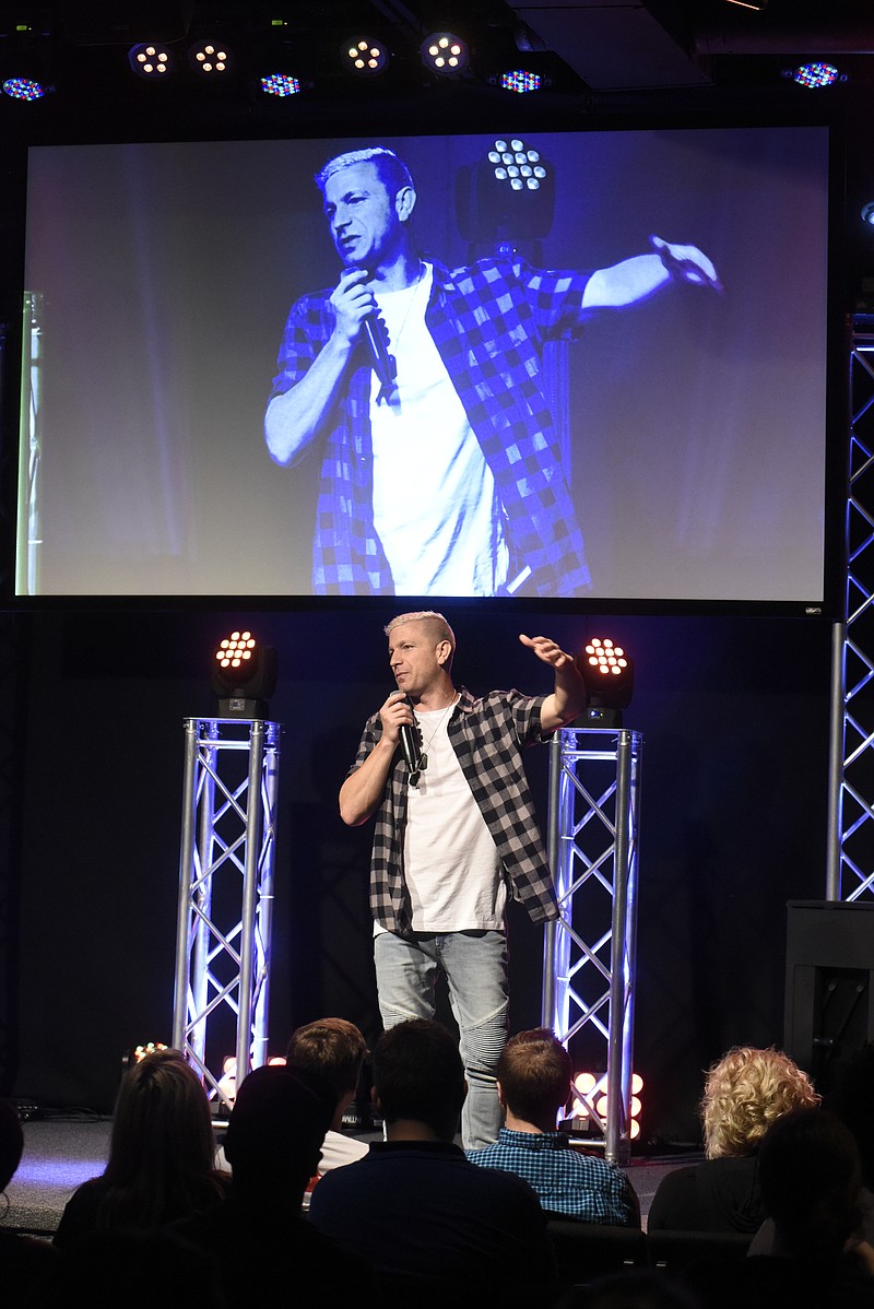 Pastor Tavner Smith leads a worship service at the Venue Church on Sunday, Oct. 25, 2015, in Chattanooga, Tenn.