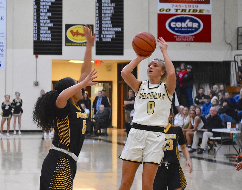 Staff photo by Patrick MacCoon / Bradley Central's Ashlan Crittenden makes a jumper in the lane during Monday's District 5-4A championship game.