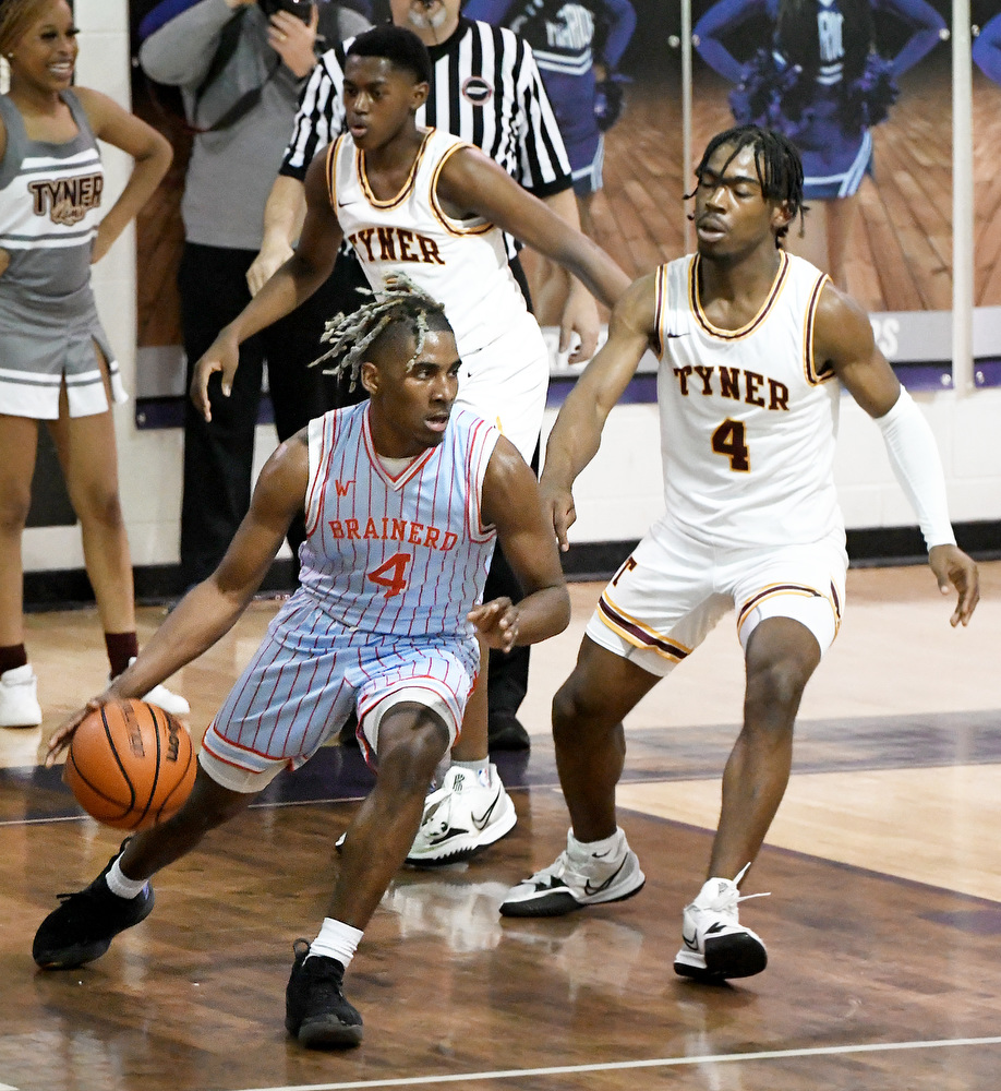 Staff Photo by Robin Rudd / Brainerd's Jakyse Locklin (4) looks to pass. The Tyner Rams met the Brainerd Panthers in the District 4-AA tournament championship, at Marion County High School in Jasper, on February 22, 2022.