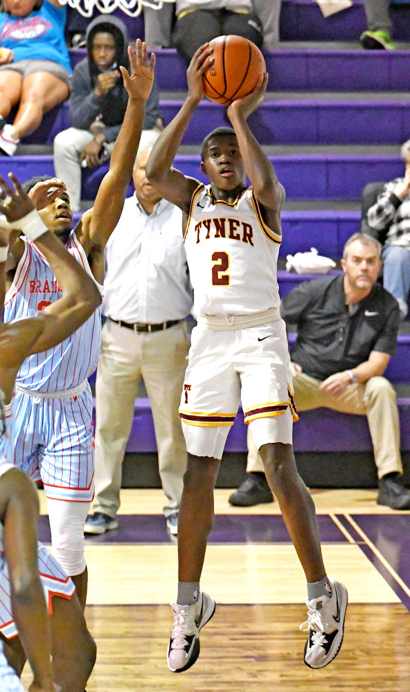 Staff Photo by Robin Rudd / Tyner's Rodney Henderson (2) shoots a baseline jumper. The Tyner Rams met the Brainerd Panthers in the District 4-AA tournament championship, at Marion County High School in Jasper, on February 22, 2022.
