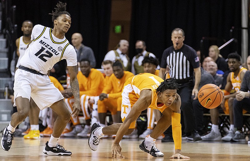 AP photo by L.G. Patterson / Tennessee freshman point guard Kennedy Chandler goes after a loose ball during Tuesday night's 80-61 win at Missouri. Chandler had 23 points, eight rebounds, six assists and two steals against the Tigers while committing no turnovers.