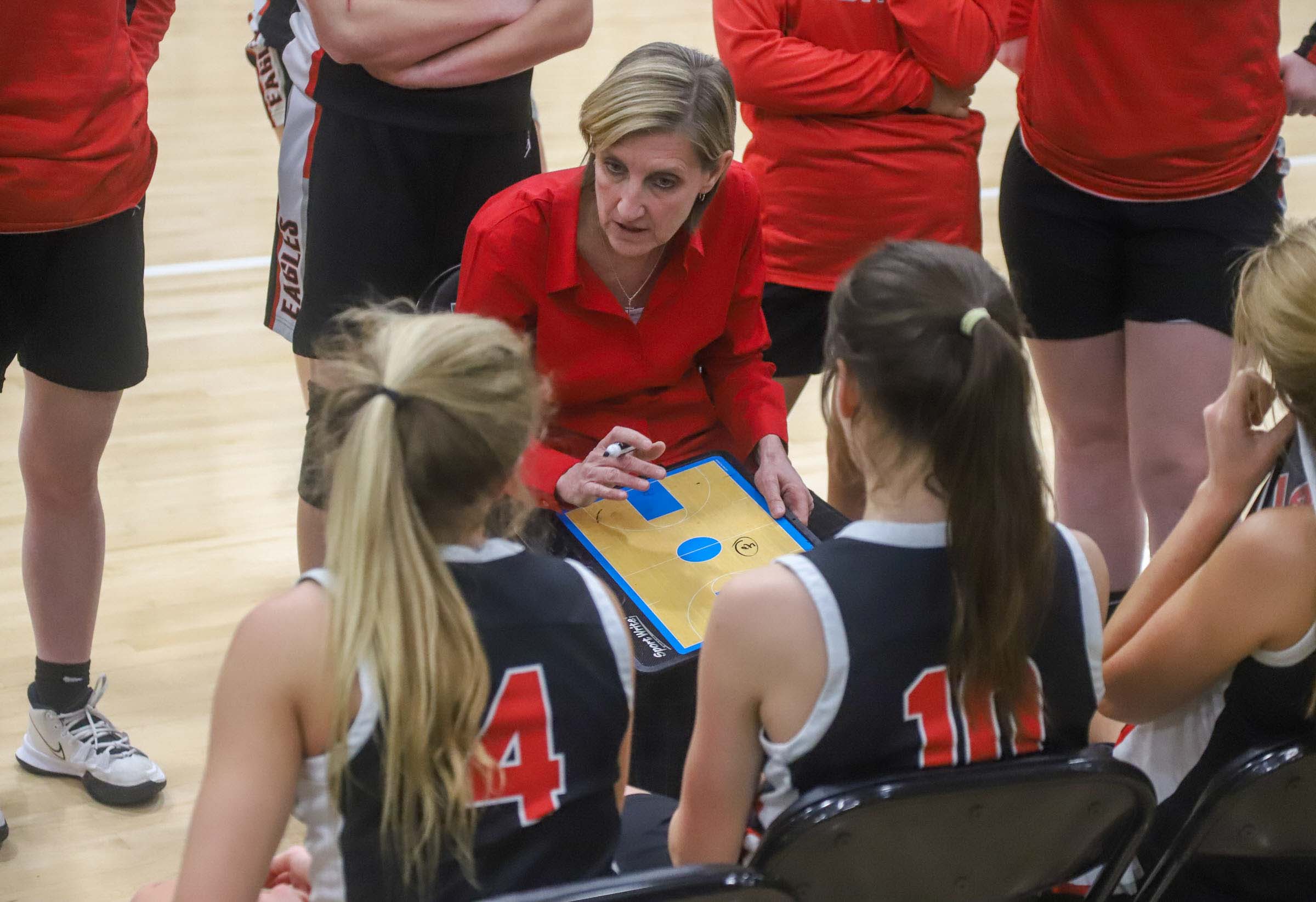Photo by Olivia Ross / Signal Mountain coach Kendra Bell strategizes with the team. Signal Mountain took on Knoxville Fulton in the Region 3-3A semifinal game.