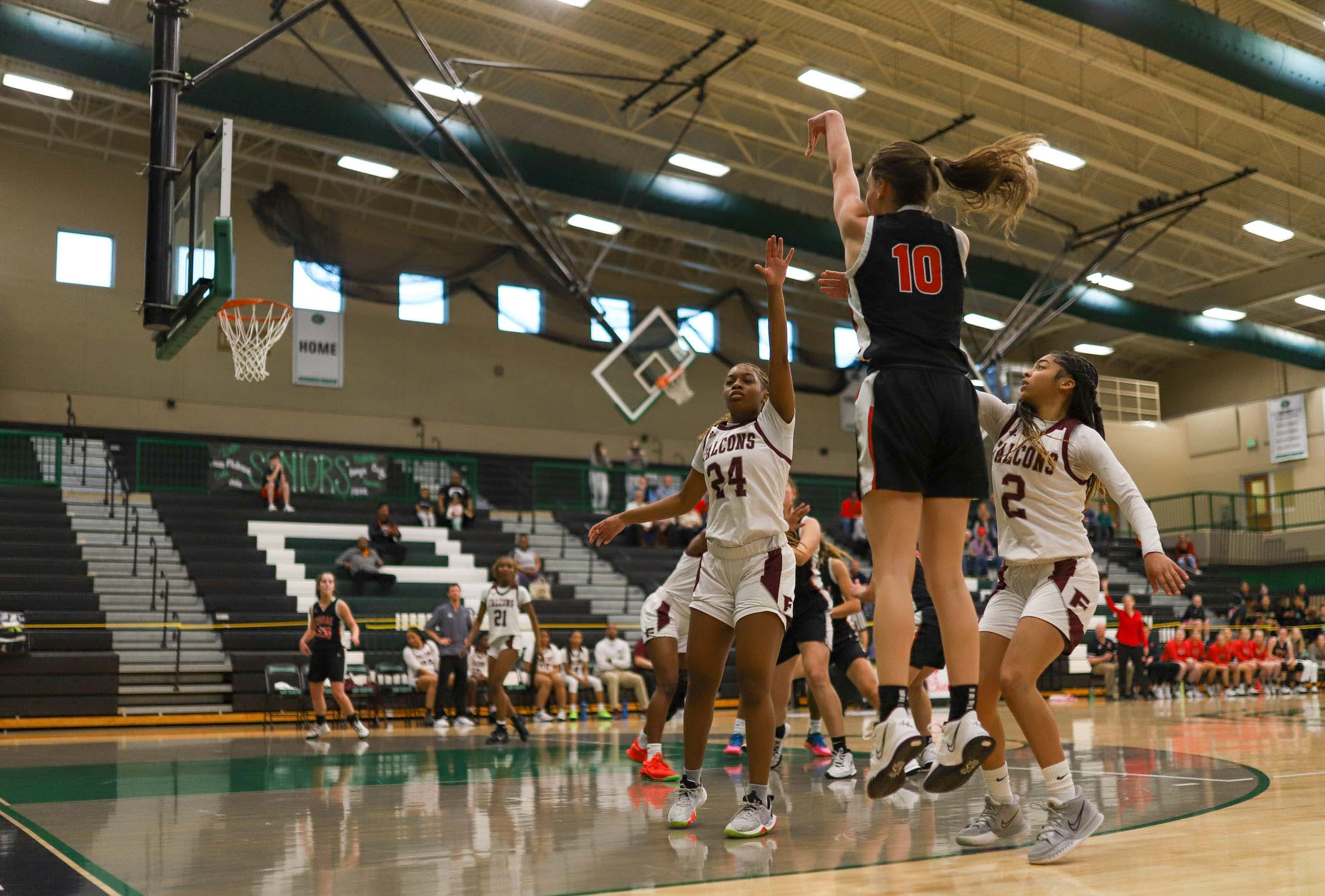 Photo by Olivia Ross / Janie Kennedy (10) tries for a jump shot. Signal Mountain took on Knoxville Fulton in the Region 3-3A semifinal game.