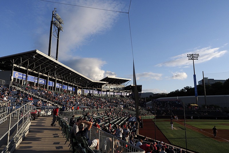 Staff file photo by C.B. Schmelter / Fans enjoy a Chattanooga Lookouts game at AT&T Field in 2021.