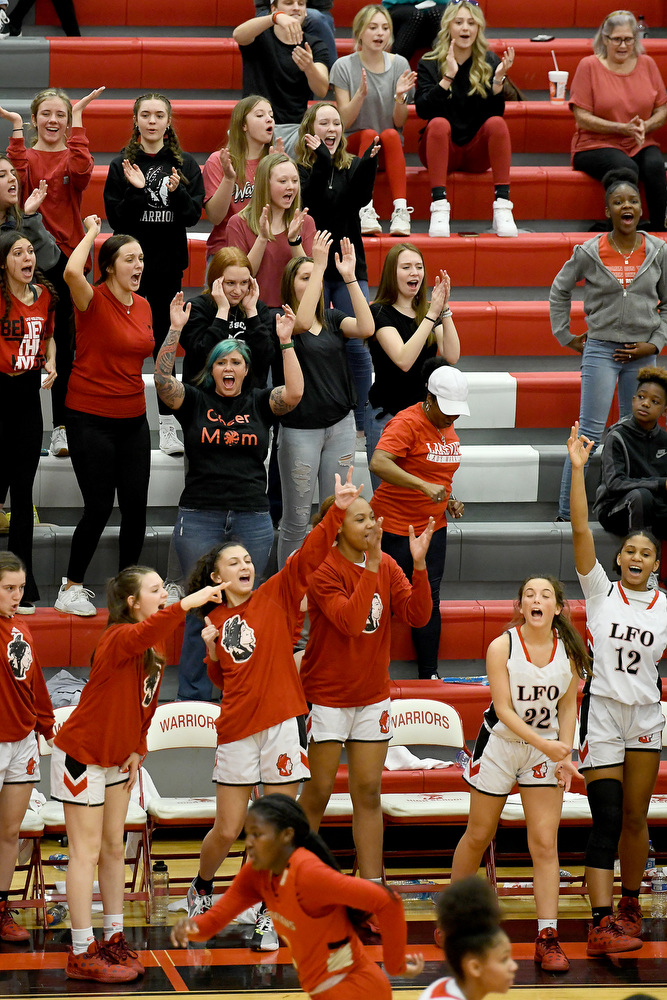Staff Photo by Robin Rudd / The Lakeview stands and bench cheer after a big basket. The Lakeview Fort Oglethorpe Lady Warriors fell to the Greater Atlanta Christian School Lady Spartans, 67 to 60, in the quarterfinals of the GHSA state tournament on March 1, 2022.