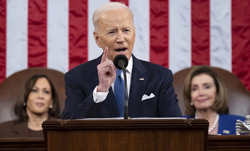 Photo by Saul Loeb/Pool via The AP / President Joe Biden delivers his first State of the Union address to a joint session of Congress at the Capitol as Vice President Kamala Harris and House Speaker Nancy Pelosi of Calif., watch on Tuesday, March 1, 2022, in Washington, D.C.