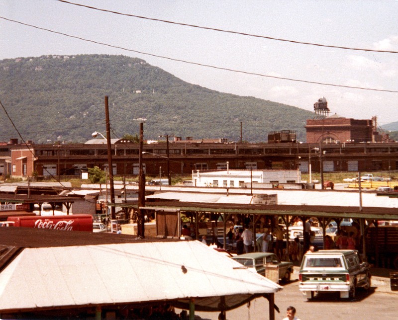 Photo contributed by ChattanoogaHistory.com. This photo of the Curb Market (also known as the 11th Street Farmers' Market) was taken in 1981, when a collection of open-air produce stands would attract hundreds of customers a day.