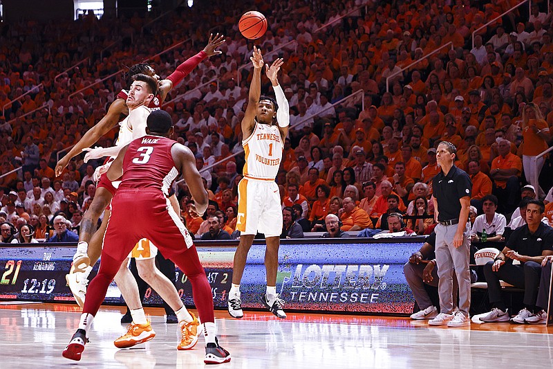 AP photo by Wade Payne / Tennessee guard Kennedy Chandler shoots during the first half of Saturday's SEC game against Arkansas at Thompson-Boling Arena. Chandler scored 15 points in the regular-season finale to help the 13th-ranked Vols beat the 14th-ranked Razorbacks 78-74 and finish their home schedule undefeated.