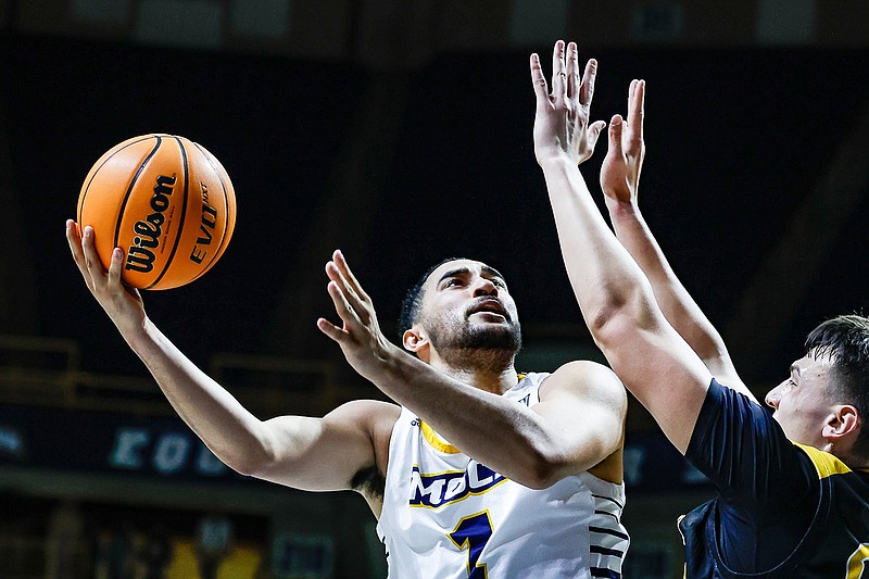 Staff file photo / UTC junior forward KC Hankton had 13 points and seven rebounds to help the Mocs win their SoCon tournament opener, 71-66 against The Citadel in Saturday's quarterfinals in Asheville, N.C.