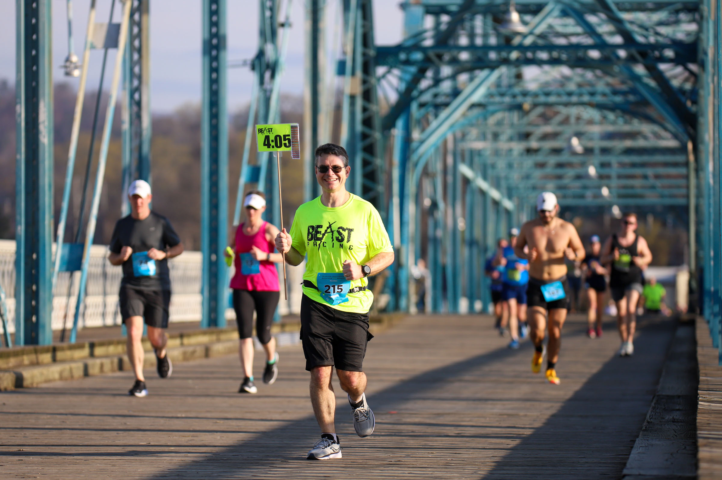 Staff Photo by Olivia Ross / Anthony Tamburello keeps the pace for runners on March 6, 2022. The Erlanger Chattanooga Marathon is a full weekend complete with a marathon, half marathon, relays, 5k, and kid's fun run.