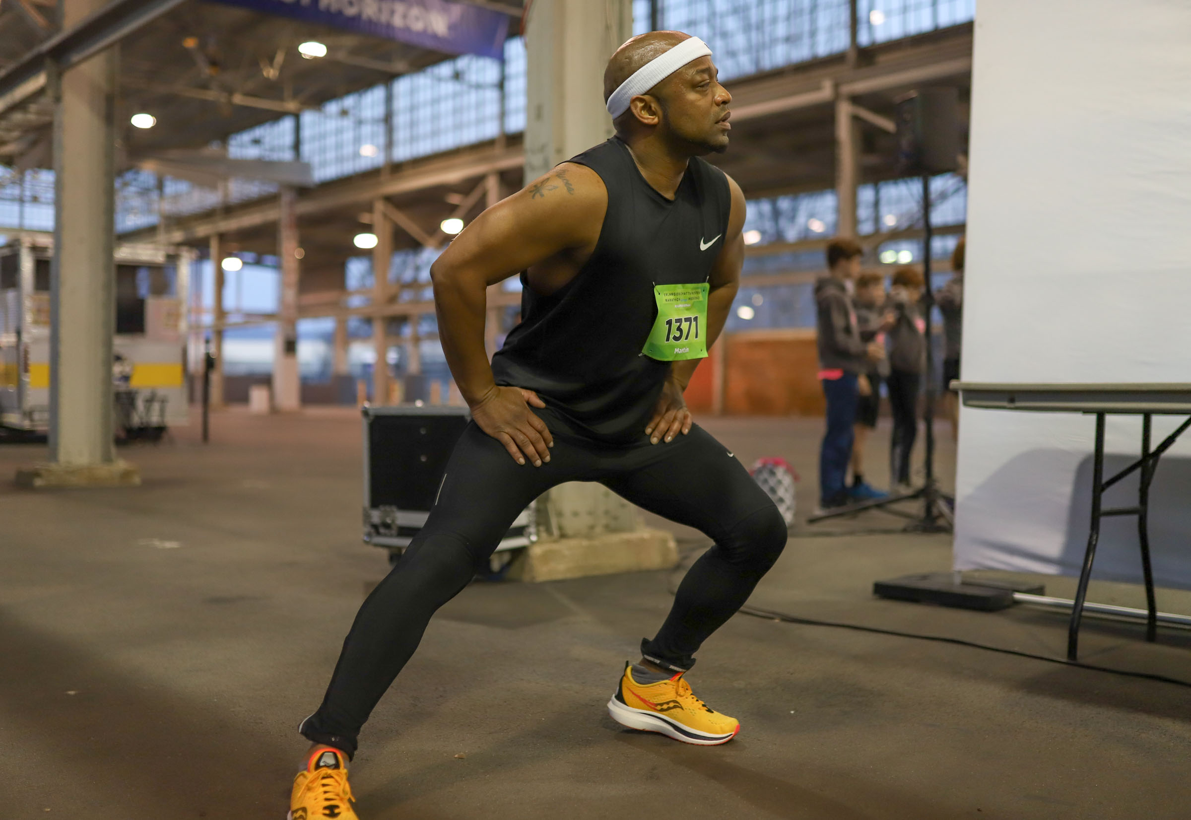 Staff Photo by Olivia Ross / Martin Roberson stretches before the race on March 6, 2022. The Erlanger Chattanooga Marathon is a full weekend complete with a marathon, half marathon, relays, 5k, and kid's fun run.