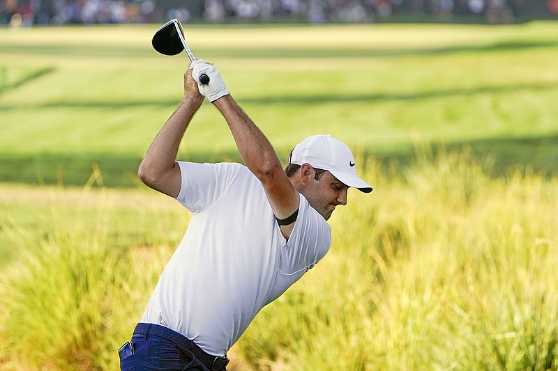 AP photo by John Raoux / Scottie Scheffler tees off on the 18th hole at Bay Hill during the final round of the Arnold Palmer Invitational on Sunday in Orlando, Fla. Scheffler won by a stroke, earning his second PGA Tour career victory after earning his first last month at the Phoenix Open.