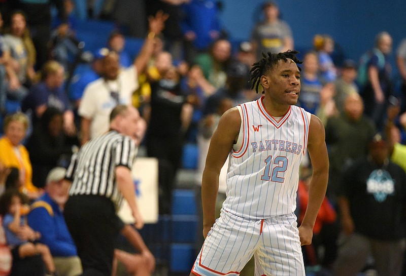 Staff Photo by Matt Hamilton / Brainerd (12) NaQuan Lay reacts after hitting a three pointer that tied the game on Monday, March 7, 2022 at Brainerd High. Brainerd hosted Gatlinburg-Pittman in a boys state sectional basketball game. 