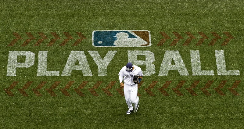 AP file photo by Gregory Bull / Players voted Thursday to accept MLB's offer on a new labor deal, paving the way to end a 99-day lockout and salvage a 162-game season for 2022.