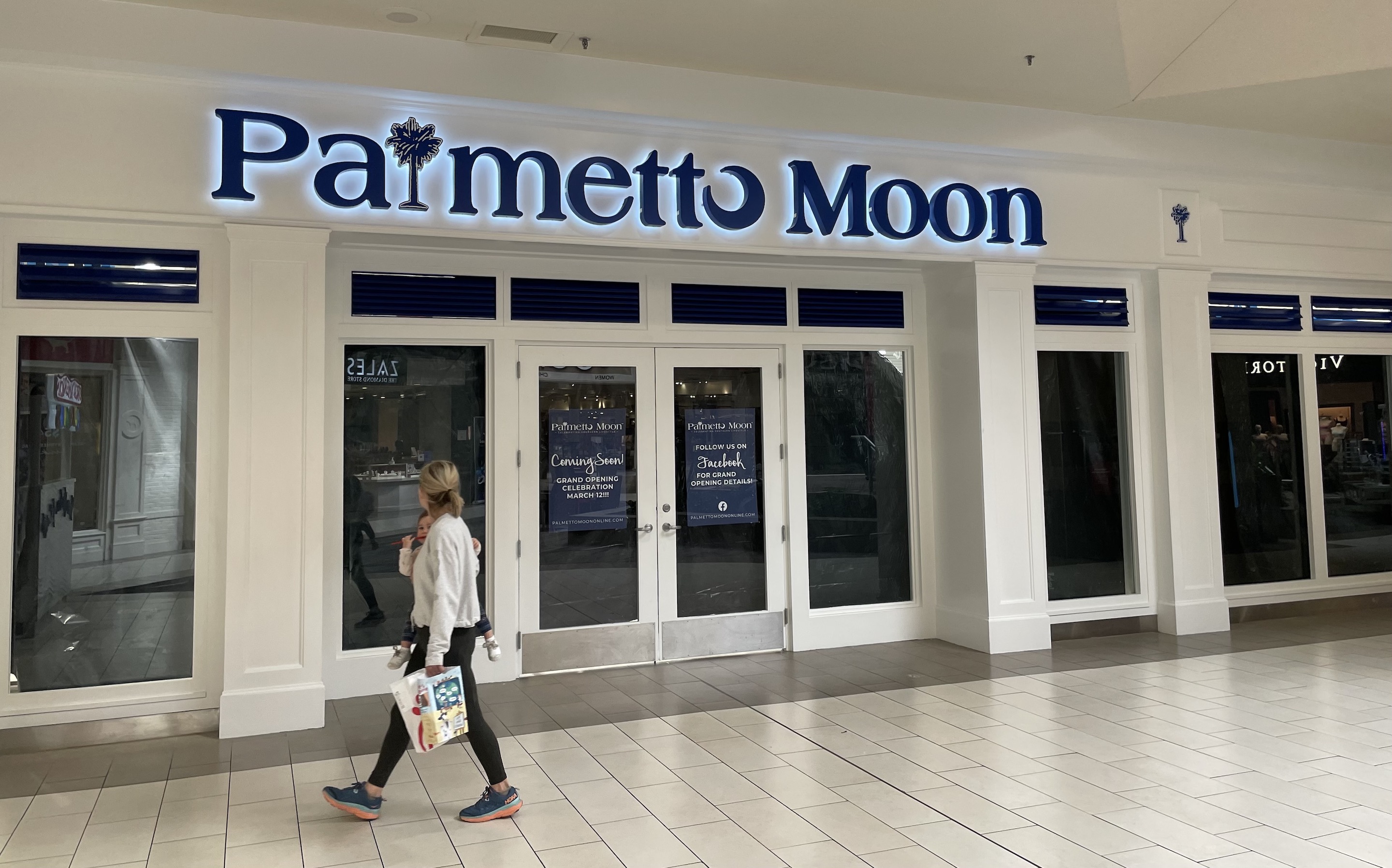 Photo by Dave Flessner / A shopper walks past the new Palmetto Moon store, which will open Saturday on the lower level of Hamilton Place Mall. The new 7,236-square-foot store fills the space at Hamilton Place previously occupied by Abercrombie & Fitch, which closed last year.
