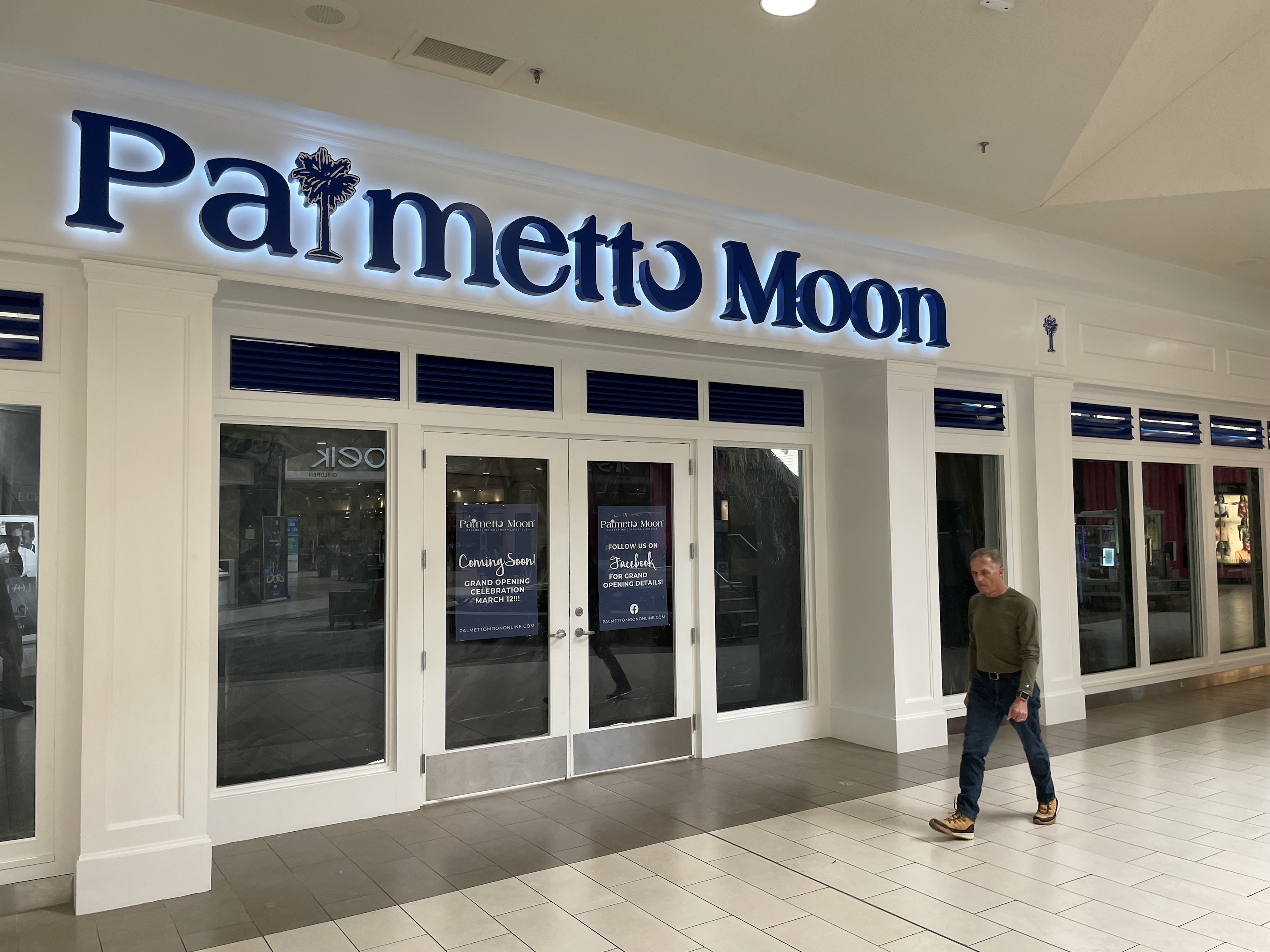Contributed photo / A shopper walks past the new Palmetto Moon store, which will open Saturday on the lower level of Hamilton Place Mall.