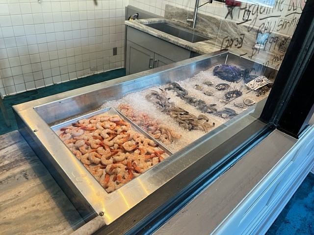 Photo contributed by Thomas "TJ" Jones / Fresh seafood is shown in cases at the Chattanooga Seafood Company on Thursday, March 10, 2022.