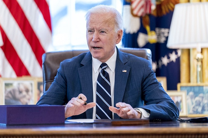 FILE - President Joe Biden speaks before signing the American Rescue Plan, a coronavirus relief package, in the Oval Office of the White House, March 11, 2021, in Washington. (AP Photo/Andrew Harnik, File)


