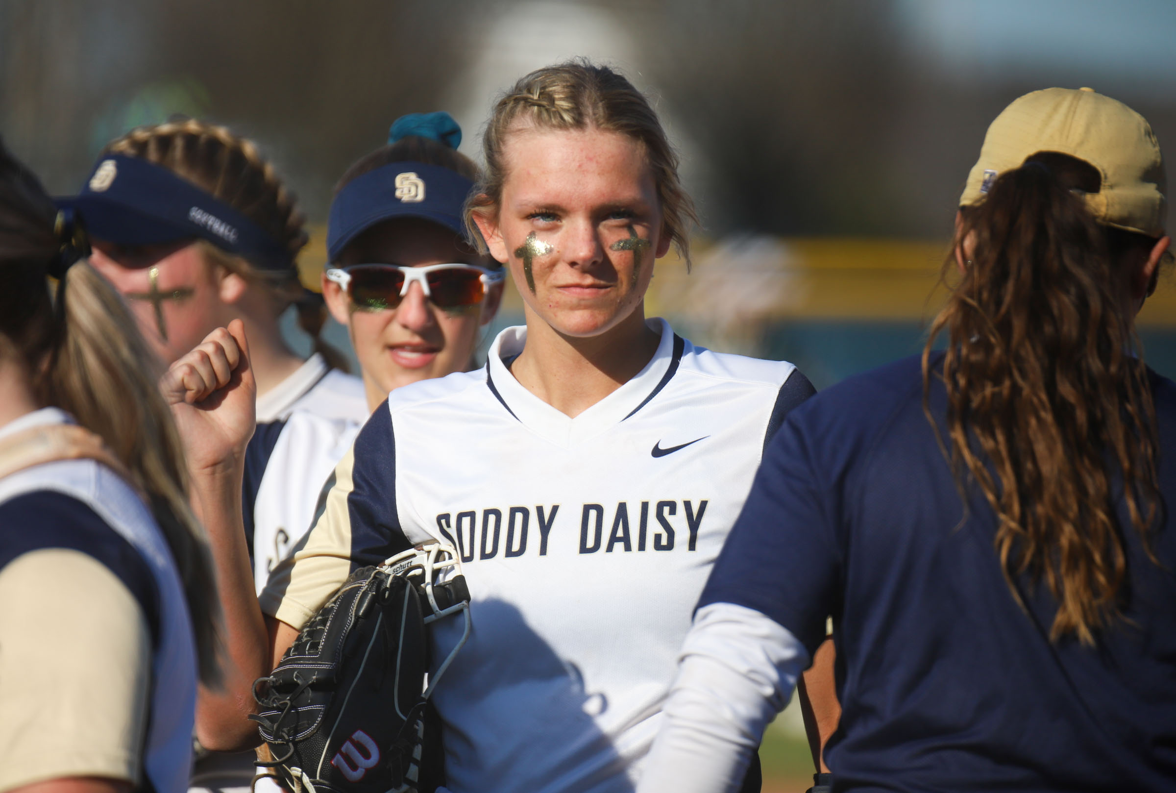 Staff photo by Olivia Ross / Taylor Lloyd (13) of Soddy Daisy raises her fist during a team chant. The Soddy Daisy Trojans took on the Silverdale Academy Seahawks on March 14, 2022 at home.