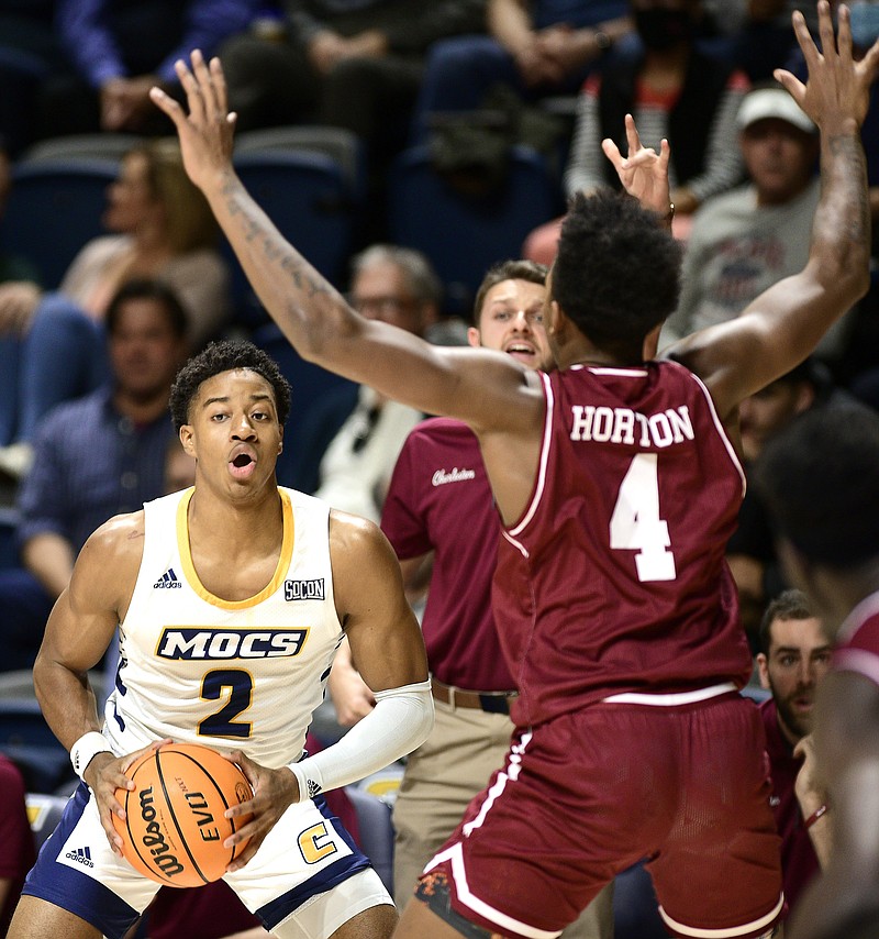 Staff Photo by Robin Rudd /  UTC's Jamaal Walker (2) looks to pass.  The UTC Mocs hosted the College of Charleston Cougars in Men's Basketball, at McKenzie Arena, on November 27, 2021.