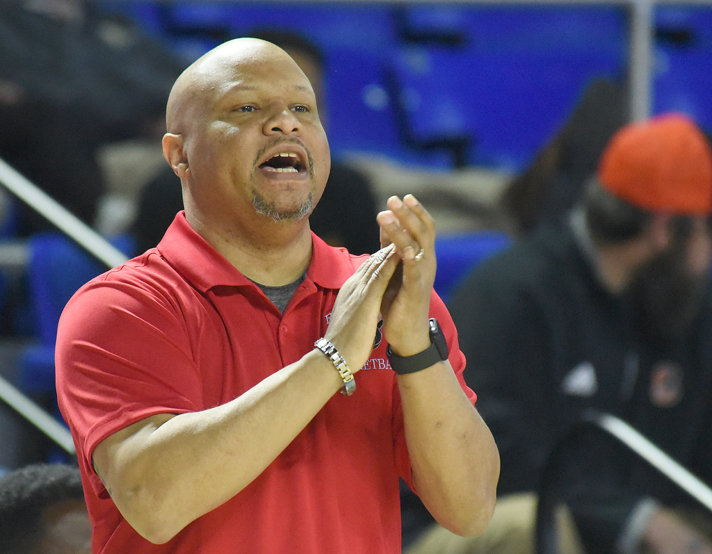 Staff Photo by Matt Hamilton / Brainerd head coach Levar Brown coaches his team on Tuesday, March 15, 2022 in Murfreesboro during the opening round of the class 2A boys state basketball tournament at Murphy Center on the campus of Middle Tennessee State University.