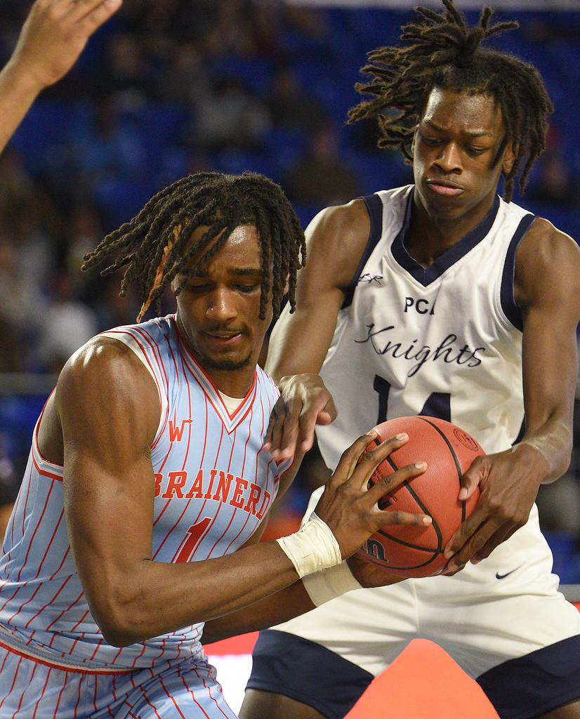Staff Photo by Matt Hamilton / Power Center Academy (14) Nazir Allen wrestles the ball away from Brainerd (1) Donivon Thomas on Tuesday, March 15, 2022 in Murfreesboro during the opening round of the class 2A boys state basketball tournament at Murphy Center on the campus of Middle Tennessee State University.