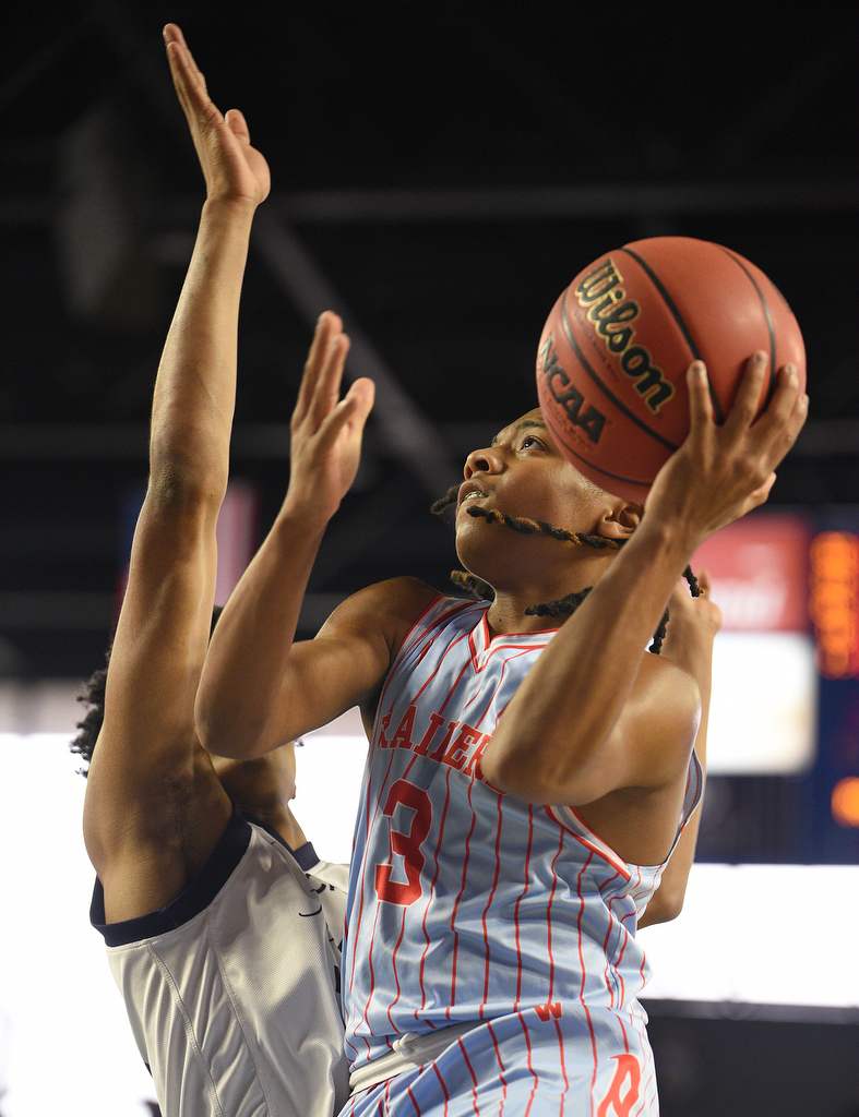Staff Photo by Matt Hamilton / Power Center Academy (10) Jordan Brooks defends as Brainerd (3) Dennis Lewis Jr. puts up a shot on Tuesday, March 15, 2022 in Murfreesboro during the opening round of the class 2A boys state basketball tournament at Murphy Center on the campus of Middle Tennessee State University.