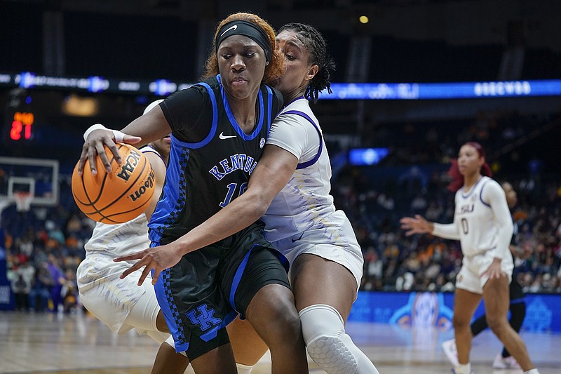 AP photo by Mark Humphrey / Kentucky's Rhyne Howard, left, and LSU's Awa Trasi battle for the ball during an SEC tournament quarterfinal on March 4 in Nashville.