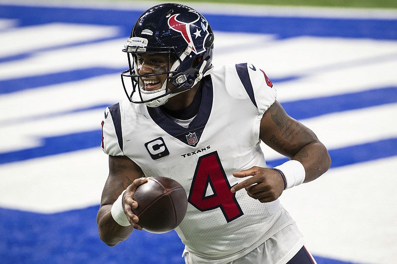 AP file photo by Zach Bolinger / Former Houston Texans quarterback Deshaun Watson has accepted a trade to the Cleveland Browns and received a record-setting contract.
