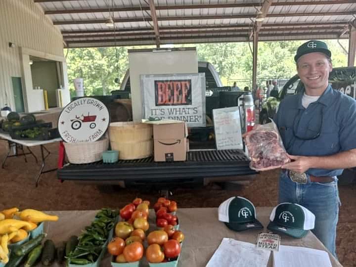 Courtesy photo by Mackenzie Boisvert / Walker County Farmers Market vendor Dalton Green shows off his products at his booth.