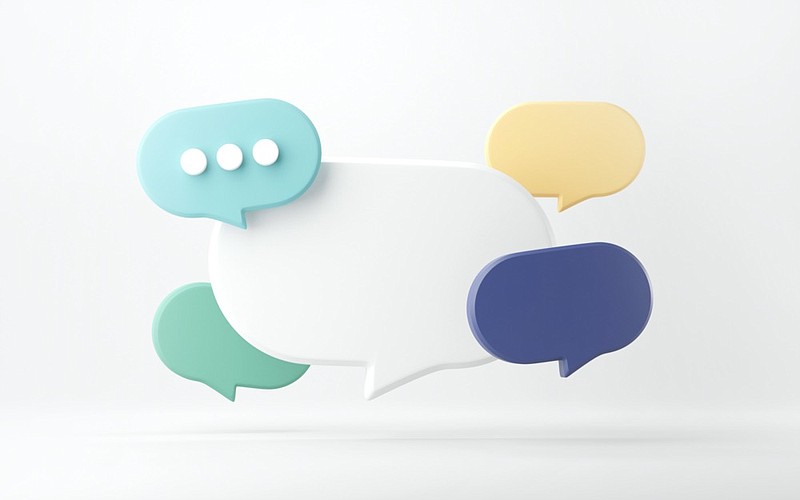 Bubble talk or comment sign symbol on yellow background. - stock photo speech tile / Getty Images
