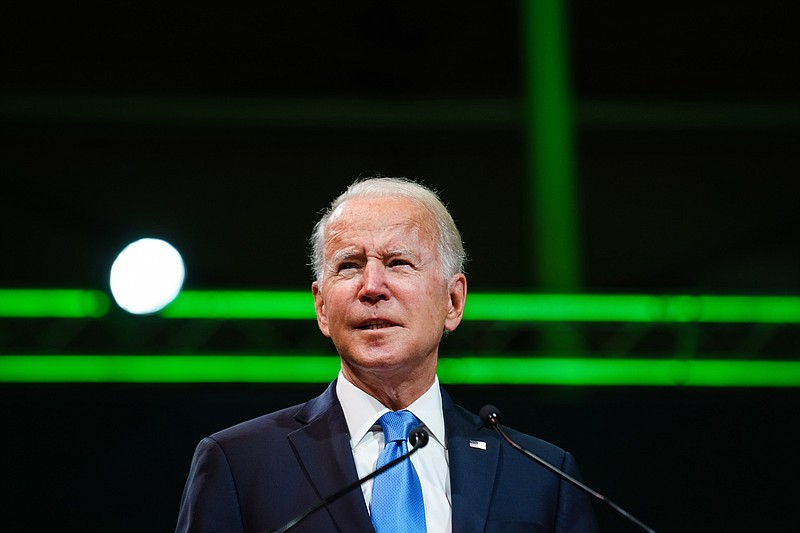 FILE - President Joe Biden speaks at COP26 in Glasgow, Scotland, Nov. 2, 2021. President Biden wants electricity generated from wind, solar and other clean sources. The Tennessee Valley Authority plans to invest in fossil fuels instead. (Erin Schaff/The New York Times)