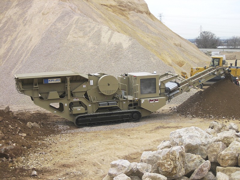 Staff file photo / Astec Industries produces a variety of machinery for road building and mining.