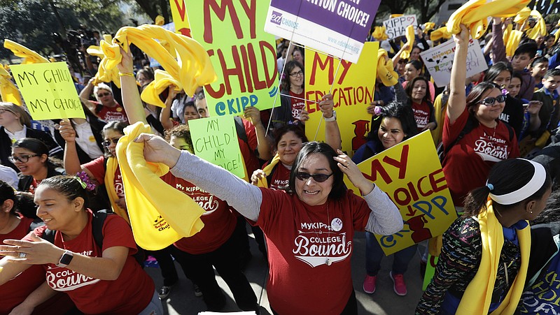 File photo by Eric Gay of The Associated Press / Parents, students and administrators take part in a rally in support of school choice on Jan. 24, 2017, in Austin , Texas, is session.