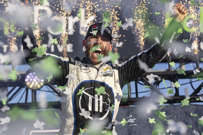 AP photo by Stephen Spillman / Trackhouse Racing driver Ross Chastain celebrates after winning Sunday's NASCAR Cup Series race at Circuit of the America in Austin, Texas.