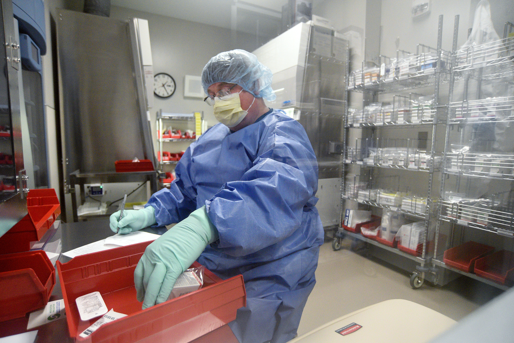 Staff Photo by Matt Hamilton / Technician David Hawthorne mixes chemotherapy medicines at Peeples Cancer Institute on Thursday, January 20, 2022 in Dalton, Ga.