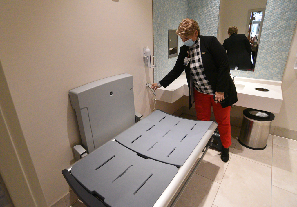 Staff Photo by Matt Hamilton / Terri Woodruff, executive director of Anna Shaw Children's Institute, talks about a specialized motorized changing table on Thursday, January 20, 2022 in Dalton, Ga.