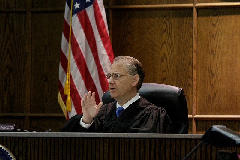 Staff File Photo / Judge Tom Greenholtz speaks in his courtroom during a 2018 arraignment.