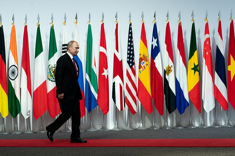 File photo by Erin Schaff of The New York Times / President Vladimir Putin of Russia is shown during the G-20 summit in Osaka, Japan, on June 28, 2019.