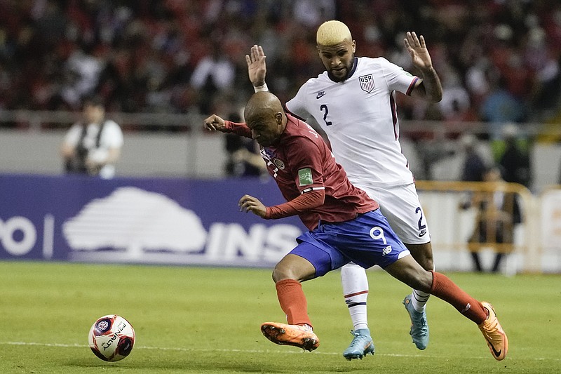 AP photo by Moises Castillo / U.S. player Deandre Yedlin, right, and Costa Rica's Jewison Bennette battle for the ball during a World Cup qualifying match Wednesday night in San Jose, Costa Rica.