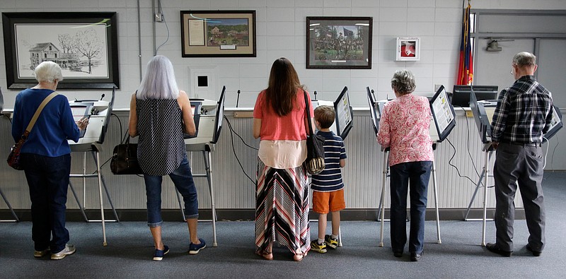 Staff file photo / Voters cast their ballots at the Chickamauga Civic Center on Tuesday, May 22, 2018, in Chickamauga, Ga.