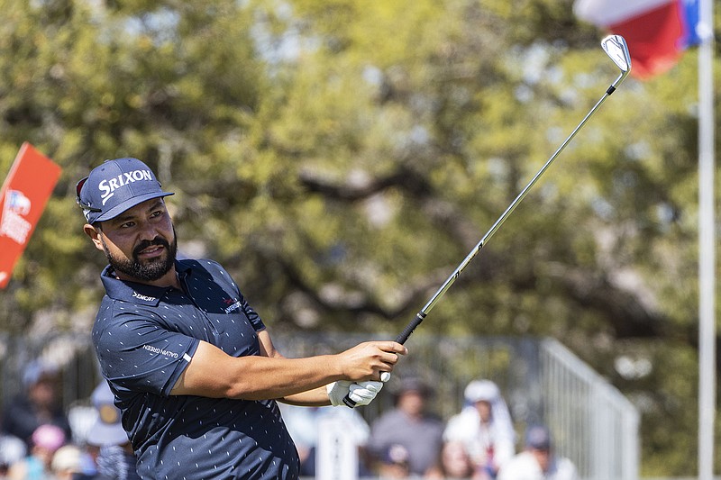 AP photo by Michael Thomas / J.J. Spaun tees off on the 16th hole at TPC San Antonio during Sunday's final round of the Texas Open. Spaun closed with a 69 for a two-stroke victory, the first win of his PGA Tour career.