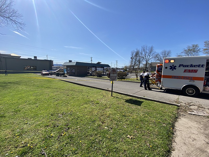 Staff photo by Stephen Hargis / Emergency crews respond to the site of a shooting in South Pittsburg on Monday.